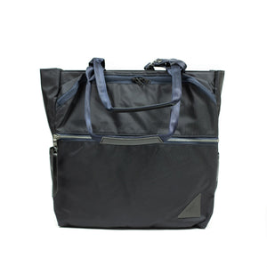 Various convertible tote in navy nylon with luggage strap (restock)