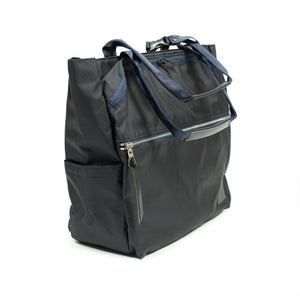 Various convertible tote in navy nylon with luggage strap (restock)