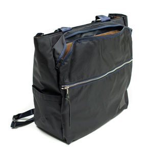 Various convertible tote in navy nylon with luggage strap (restock)