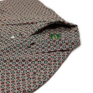 Tile camp collar shirt in green and orange mosaic print cotton