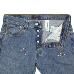 Vintage Levis 501 jeans with embroidered paint splatter, medium wash