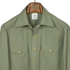 Pearl snap Western shirt in green cotton seersucker