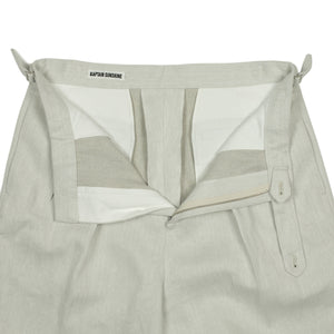 Pleated side-tab trousers in bleached natural linen herringbone