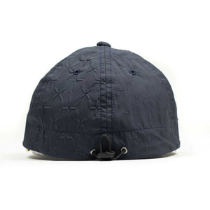 Drawcord cap in dark navy criss cross
