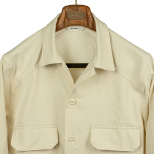 Officer jacket in washed natural herringbone cotton