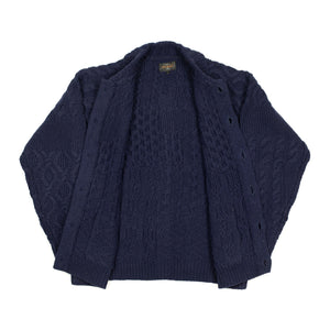 Crazy cable knit Aran cardigan in navy wool