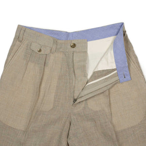 Pleated tapered trousers in ivory houndstooth linen and cupro