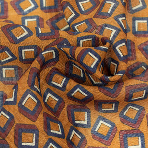 Wool square in ochre with navy and brown deco motifs