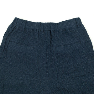Drawstring trousers in shirred indigo-dyed cupro