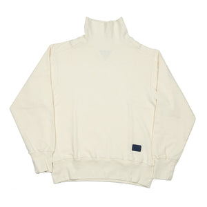 Rollneck in cream garment washed jersey (restock)