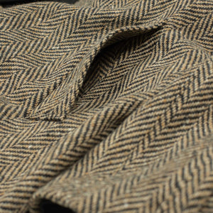 Belted balmacaan coat in handloomed Donegal oatmeal-black herringbone tweed
