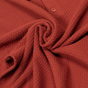 Knit short sleeve polo in brick red mini diamond pattern cotton