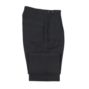 Relaxed pleated trousers in black paper and linen