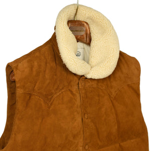 Down-filled vest in tan suede