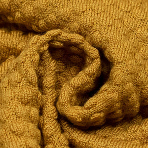 GRP Bubble stitch rollneck in ochre merino wool